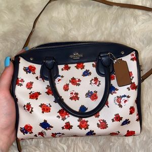 Coach crossbody purse with blue and red flowers